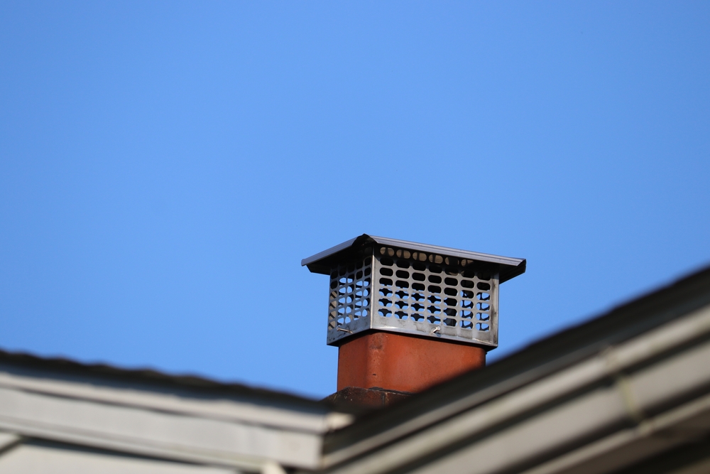 Chimney,Cap,Topper,On,House,Roof,Terra,Cotta,Liner,Blue