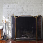 Fireplace,With,Black,Fire,Guard,Screen,And,Tools,Like,Shovel