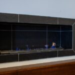 Cozy,Gas,Fireplace,In,The,Living,Room,Of,A,Rural