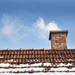 Smoke,Raising,From,A,Chimney,In,Winter